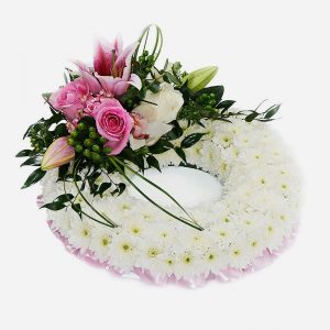 Pink massed funeral wreath